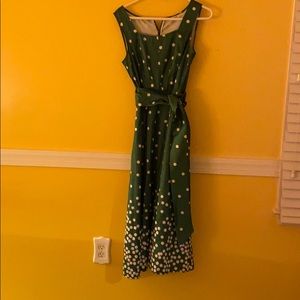 Green sleeveless summer dress.